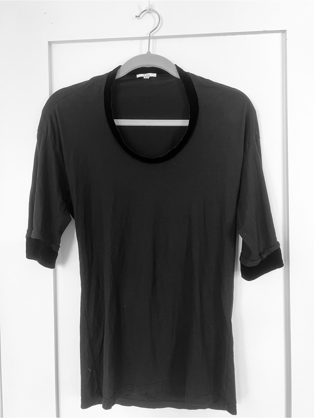 Black cotton top with velvet trim from Clu. Size XS. Excellent condition.